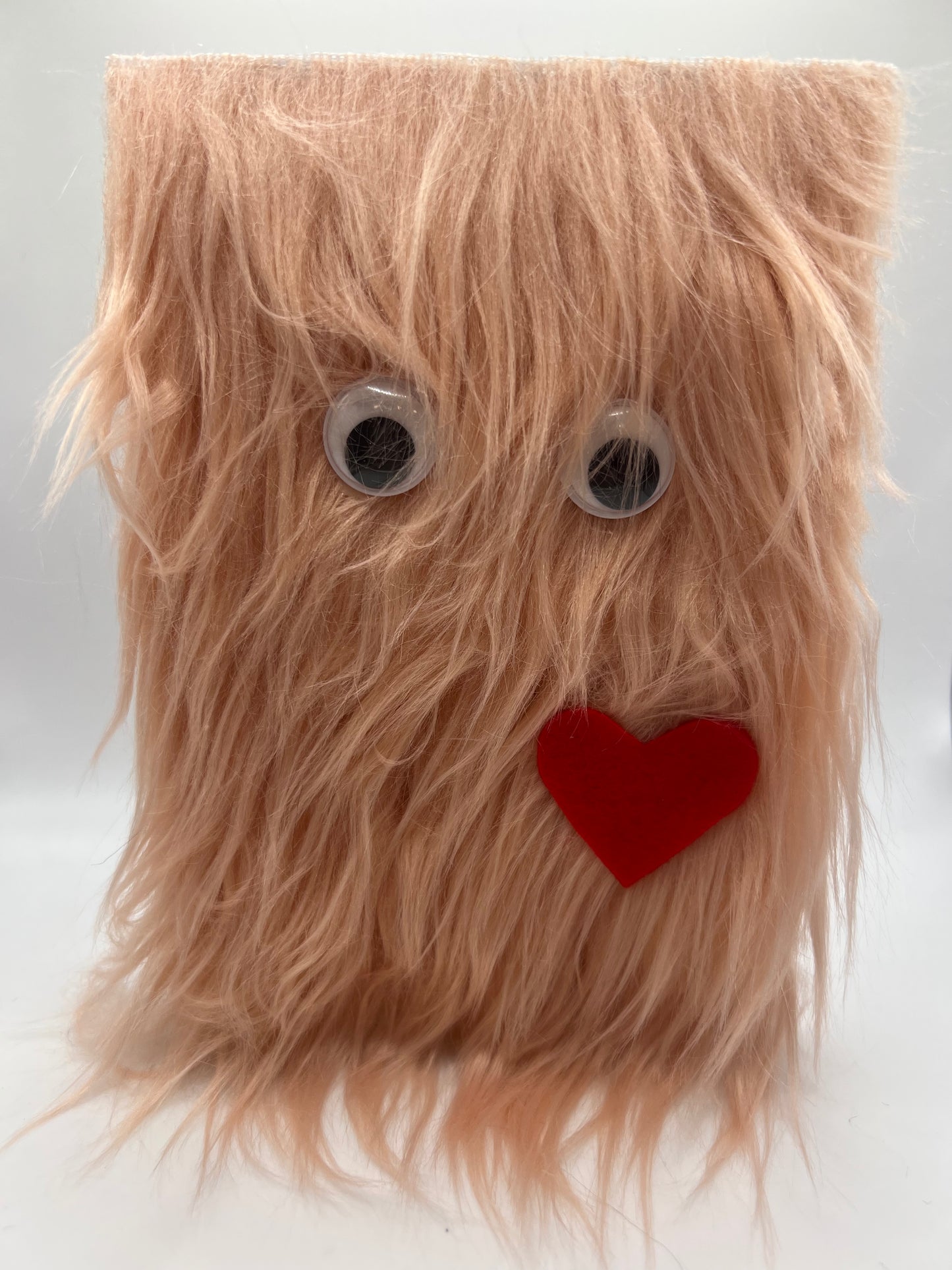 Beige fuzzy monster apology card front