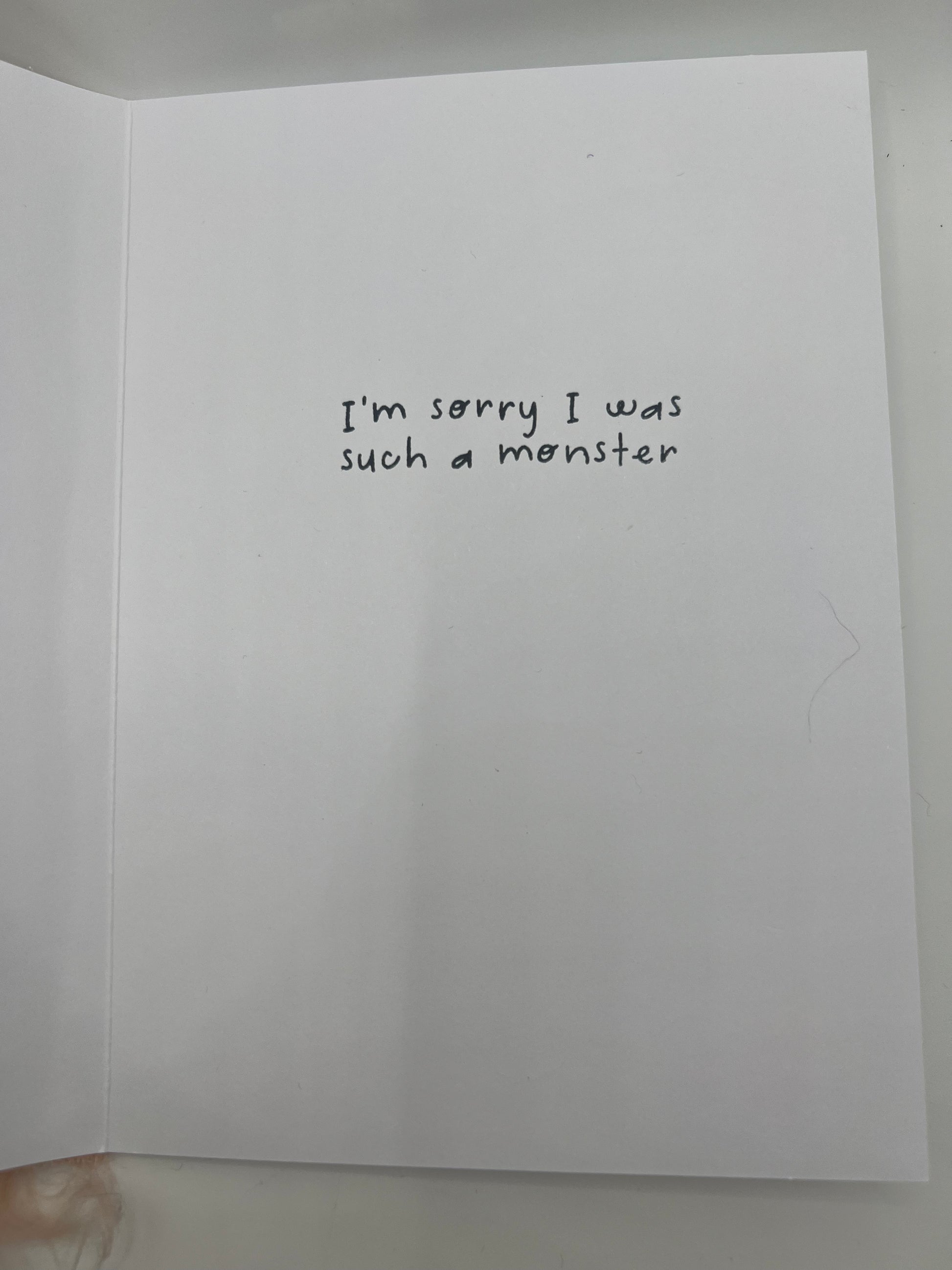 Inside reads: I'm sorry I was such a monster