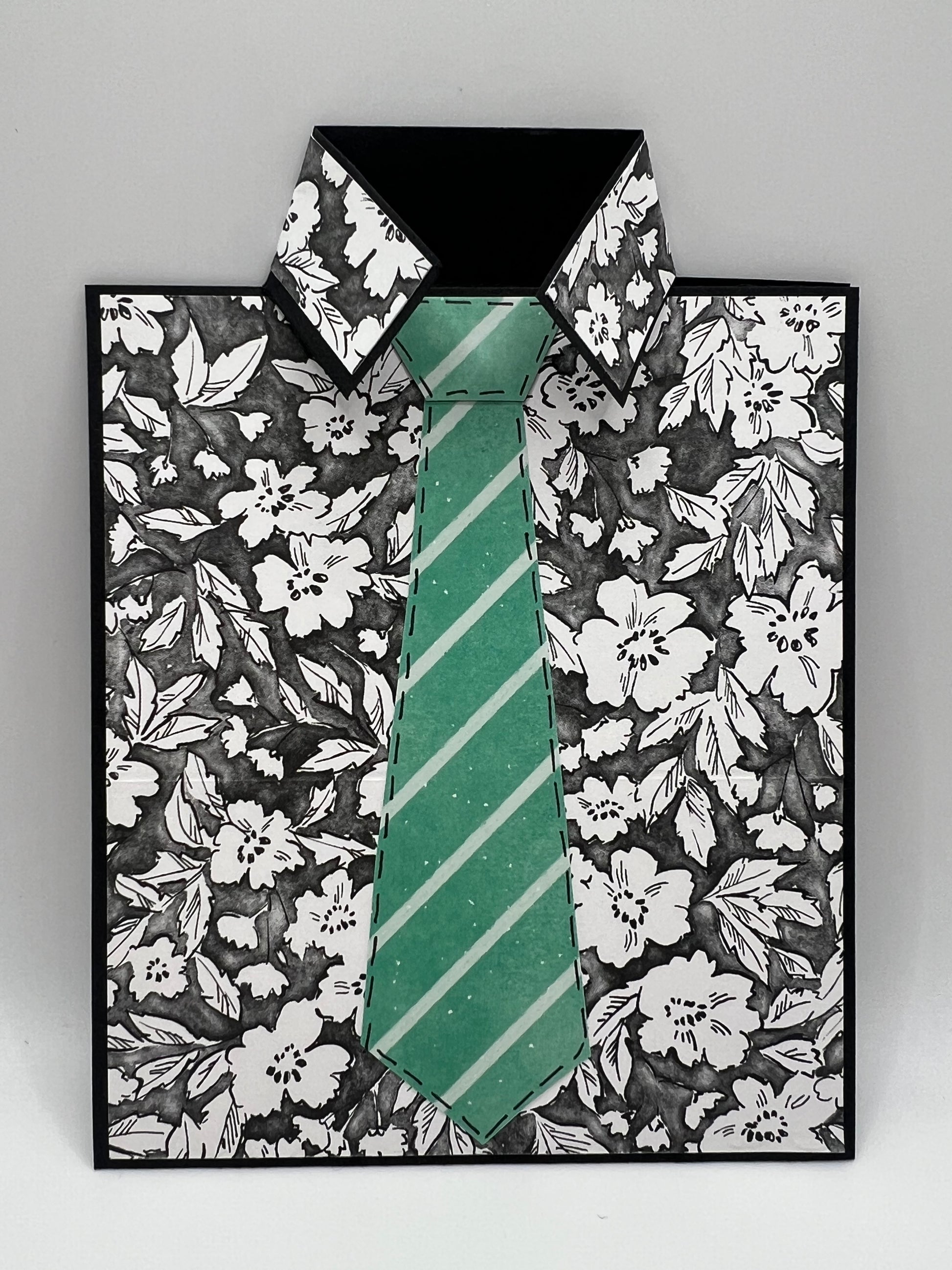 Black floral shirt and green tie Father's Day card front