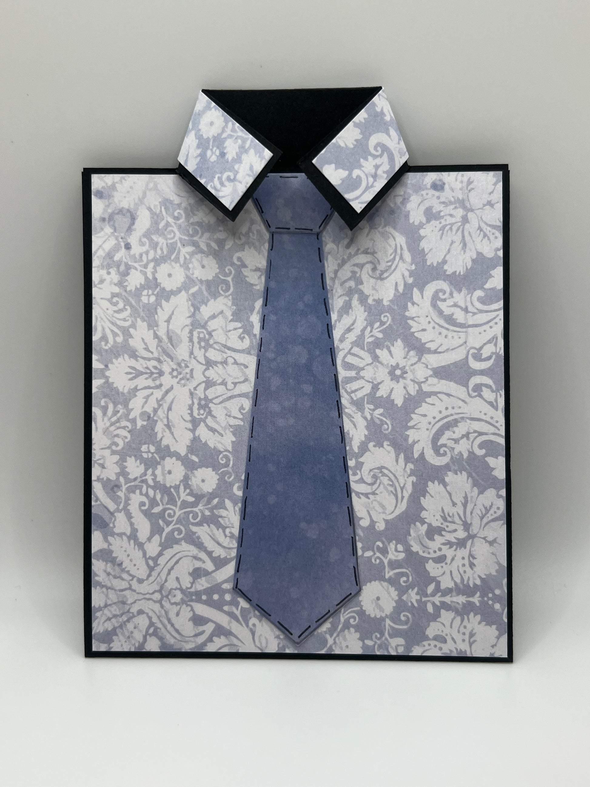 Silver floral shirt and grey-blue tie Father's Day card front