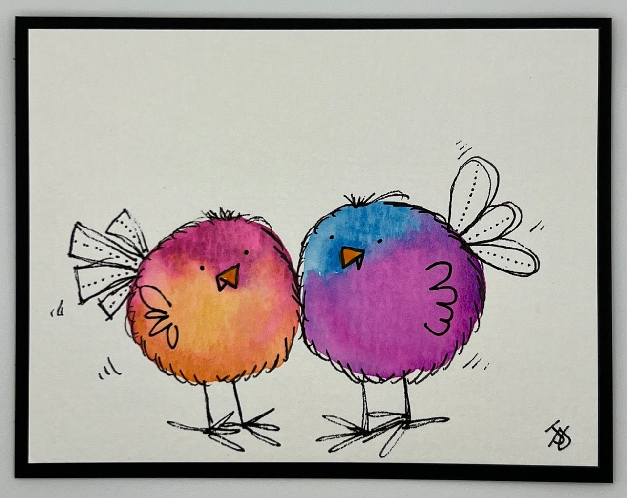 Watercolour card of two fluffy birds, one orange-pink and one blue-purple
