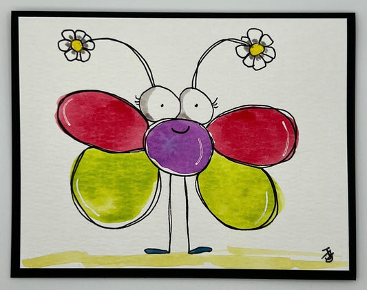 Watercolour card of a smiling butterfly on grass with flower antennae